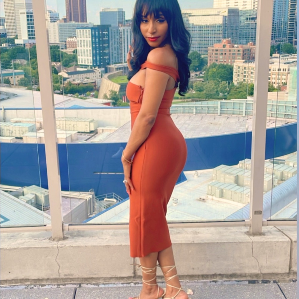 This brown dress was worn once to a wedding still like new.